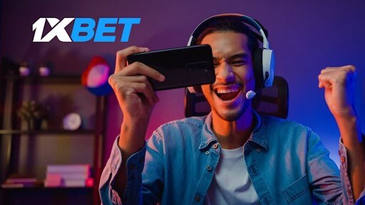 Wolverhampton Wanderers - Luton Town - gamer in a headset celebrating with his phone